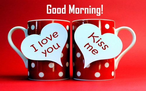 Red polka dot mugs with an inscription on a red background