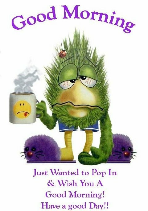 A sleepy green weirdo in purple Slippers holds a mug of d...