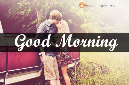 A guy and a girl gently kiss in nature early in the morning