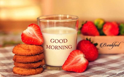 Romantic Breakfast with strawberries, milk and cookies