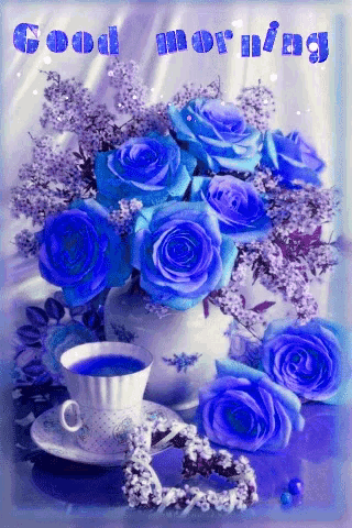 Good morning with a bouquet of blue roses in a vase on th...