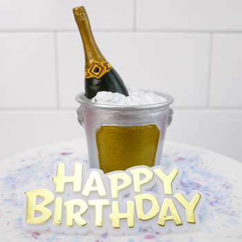 Champagne bottle on ice cake topper and happy birthday mo...