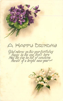 A happy birthday violets above lilies of the valley below