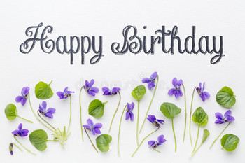 Happy birthday greetings with viola flowers stock image i...