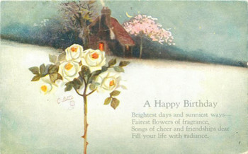 A happy birthday snow scene cottage behind roses left tuc...