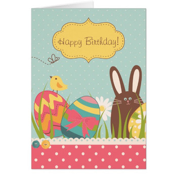 Cute bunny and colorful easter eggs happy birthday card
